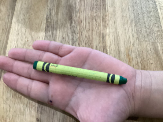 One used green crayon